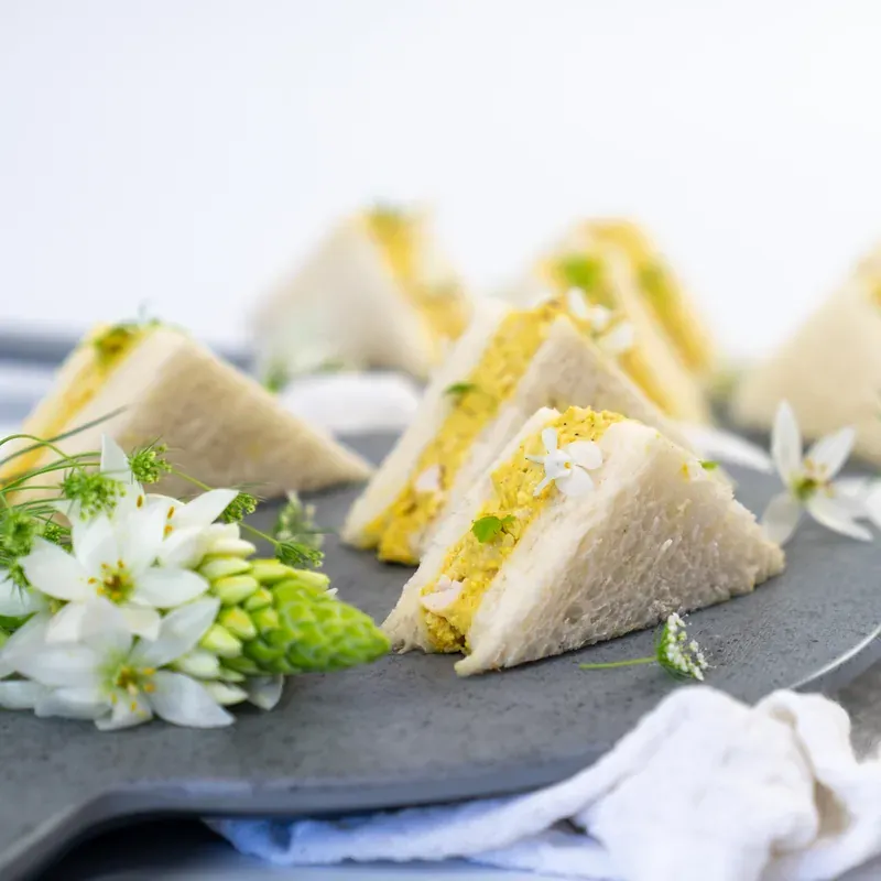 Gourmet finger sandwiches prepared for a funeral gathering